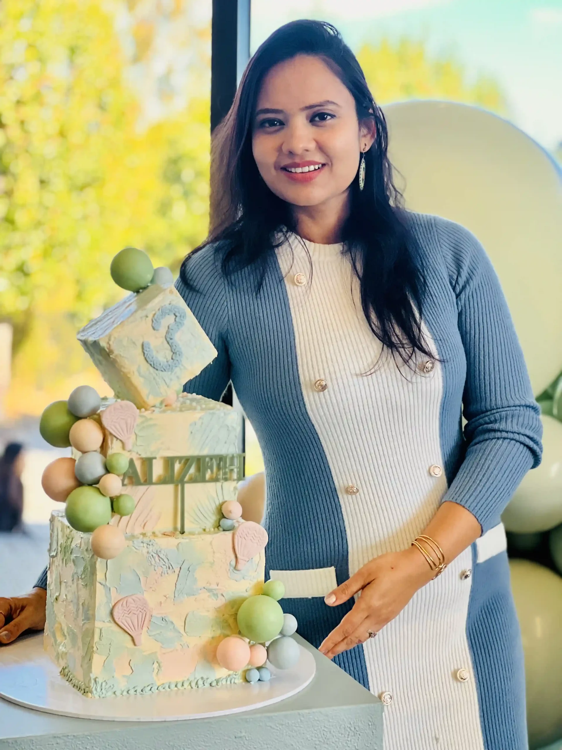 Shubhra Ghosh displaying hand-crafted cake for 3rd birthday in ryde sydney.